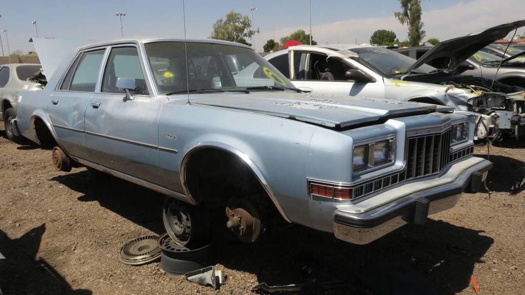 00-1988-dodge-diplomat-in-arizona-wrecking-yard-photograph-by-murilee-martin.jpg