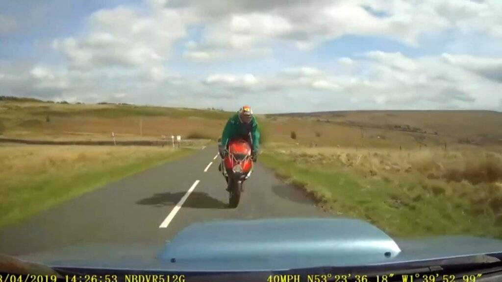 01-24-20.Horrific Footage Shows Head-On Motorbike Crash with Car.1080p_00_00_11_02.jpg