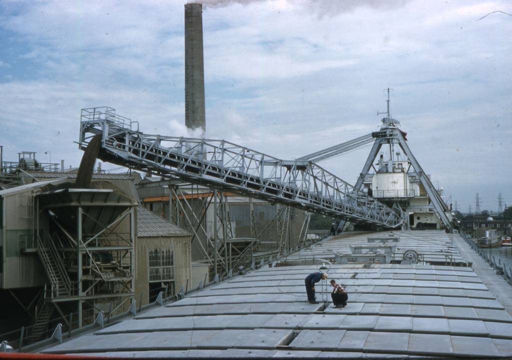 1280px-Bradley_Unloading_in_Hopper_1958.jpg