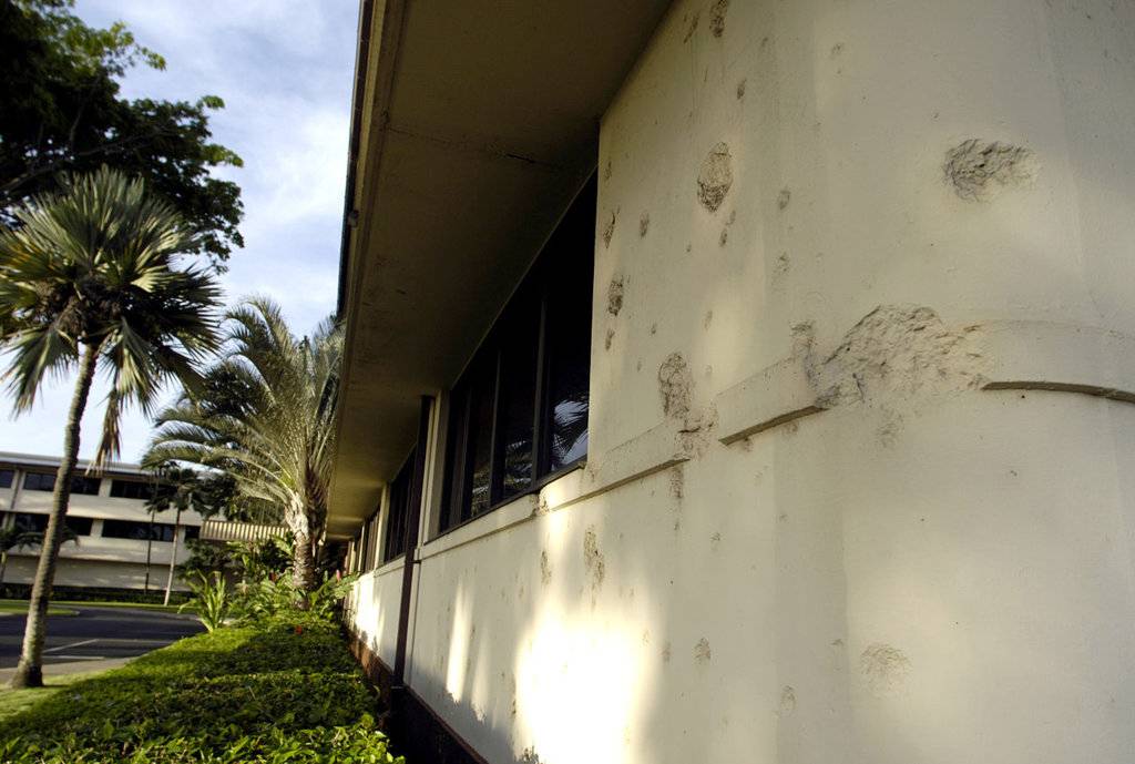 1280px-Bullet_holes_at_headquarters_building_of_Hickam_Air_Force_Base.jpg
