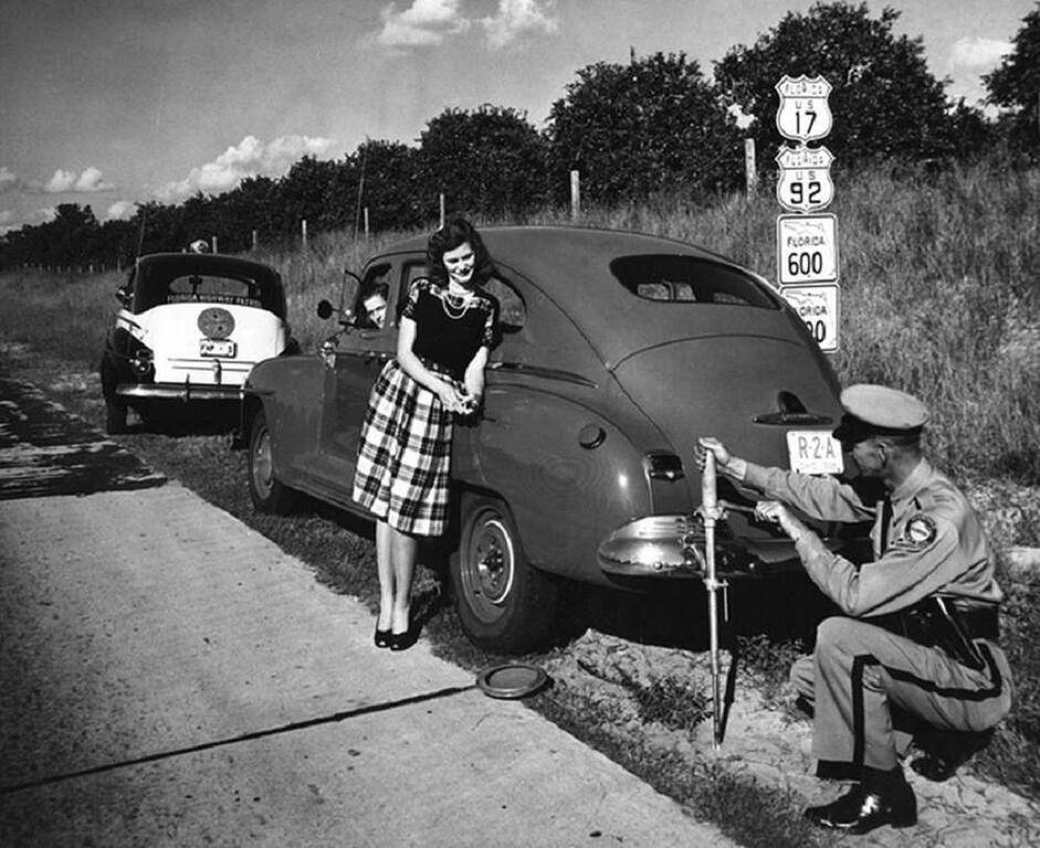 1940-police-flat-tire-girl-jpg.jpg