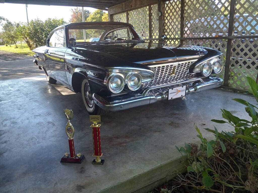 1961 fury with 2 1st place trophies.jpg