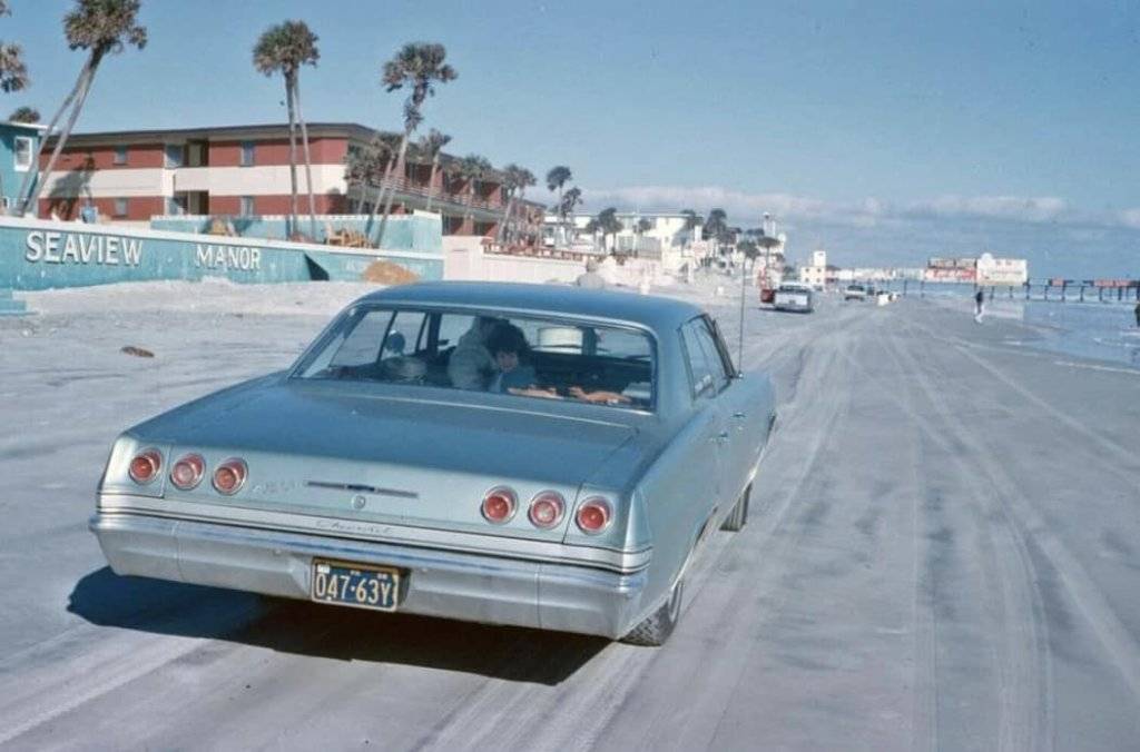 1965 Chevy Impala on Beach in front of Seaview Motel.jpg