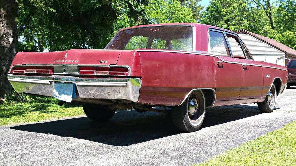 1967 Plymouth Fury III 383 4spd 4dr sdn red.004.jpg