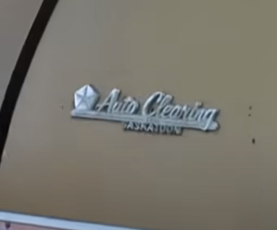 1972 Plymouth Fury Wagon Tailgate Dealer Badge.jpg