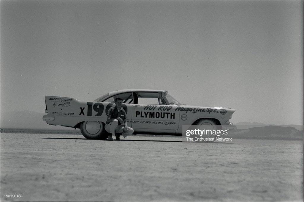 57-dry-lakes-speed-trials-wally-parks-poses-in-front-of-hot-rod-m-jpg.jpg