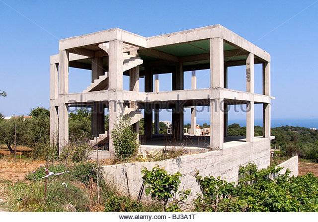 abandoned-construction-of-a-building-of-armoured-concrete-in-rethimno-bj3a1t.jpg