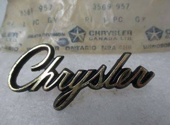 Chrysler head light cover emblem - 1978.JPG