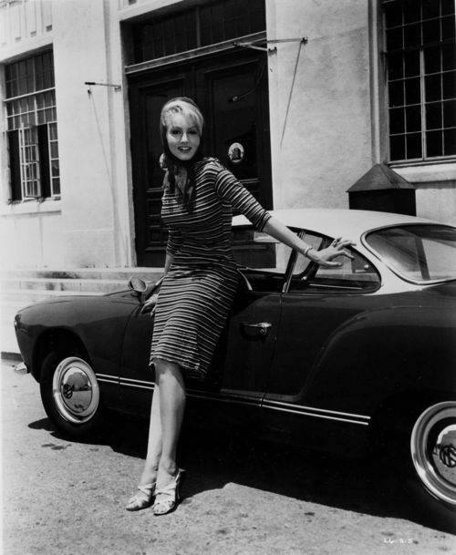 g-up-against-her-Volkswagen-Karmann-Ghia-outside-Fox-Studio%E2%80%99s-back-lot-c.-1960%E2%80%99s.jpg