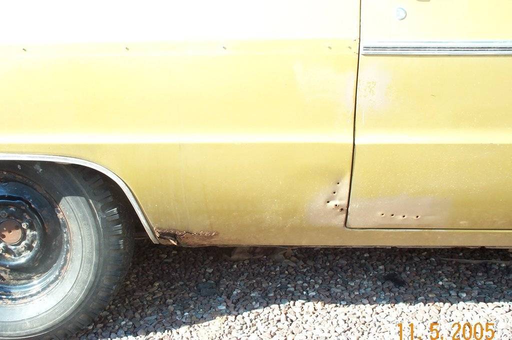 Gold Right Qtr rot dents pulled.jpg