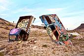 junk-cars-artistically-buried-in-the-desert-near-goldfield-nevada-f0ypxr.jpg