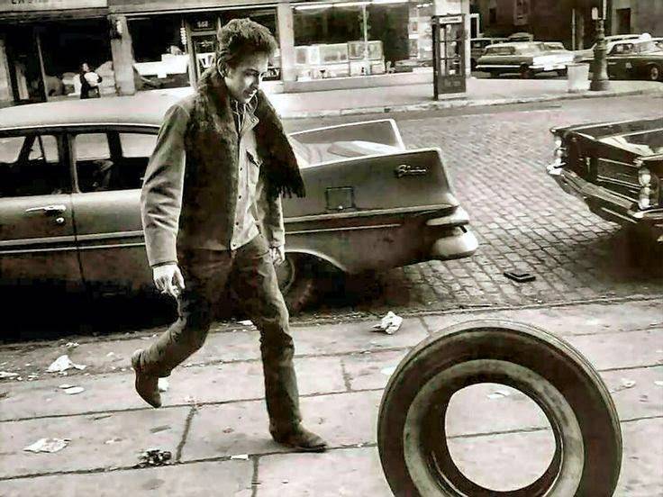 ob%2BDylan%2BRolling%2Ba%2BTire%2BDown%2Bthe%2BStreet%2Bin%2BGreenwich%2BVillage%2C%2Bc.%2B1960s.jpg