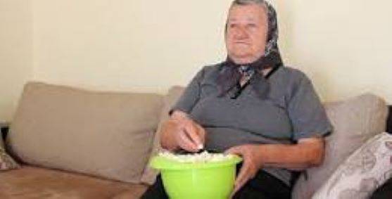 Old Lady Eating Popcorn -2.jpg