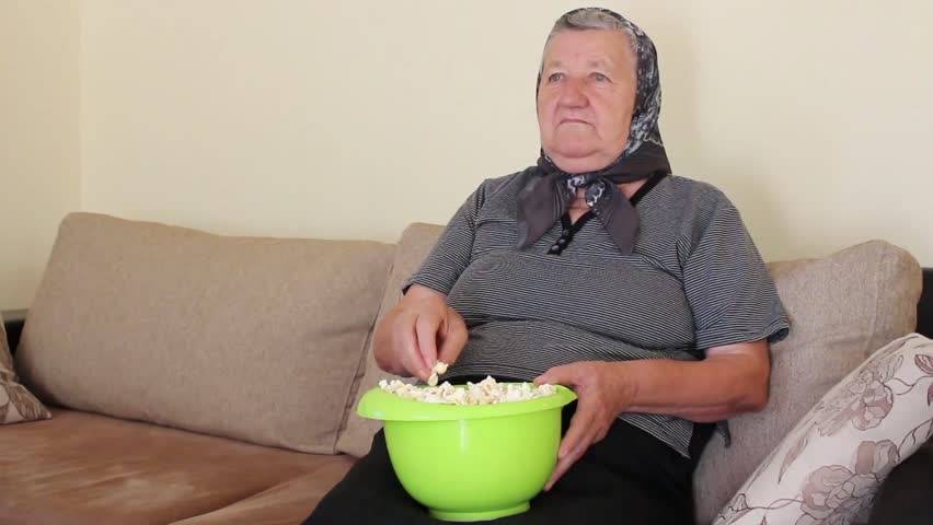 old lady eating popcorn.jpg