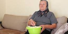 Old Lady Eating Popcorn.jpg