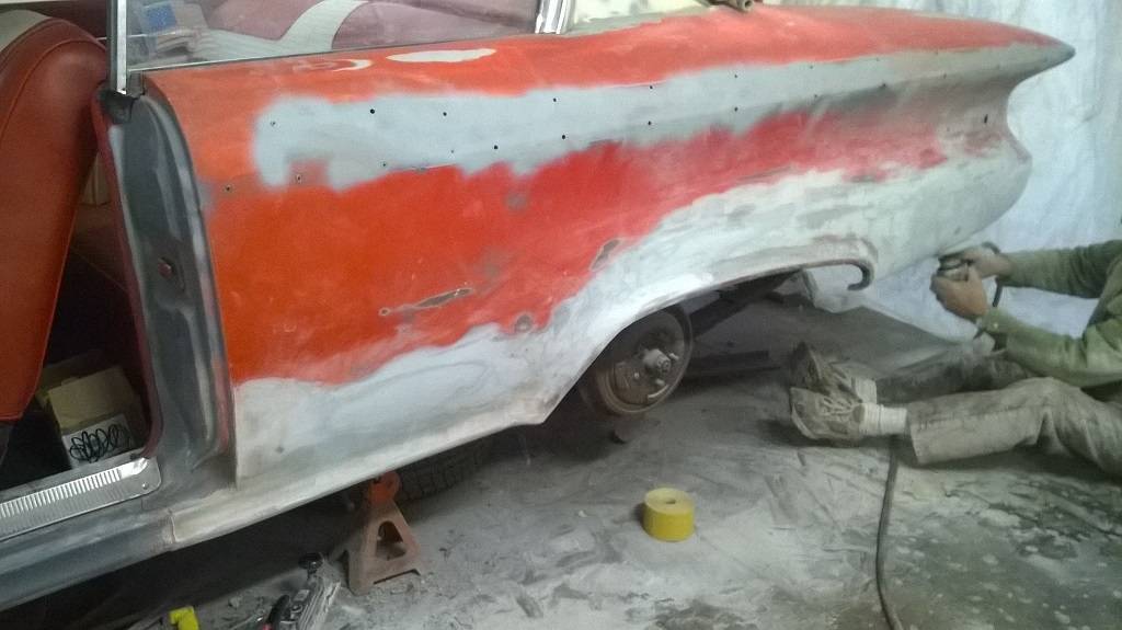 sanding the quarter panel.jpg