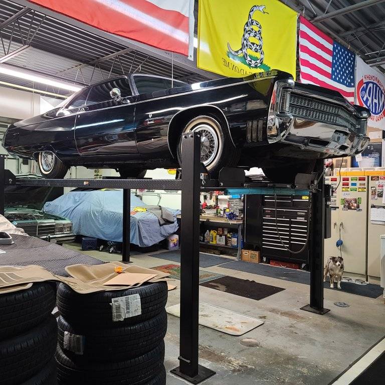 Shop lifted on hoist.jpg