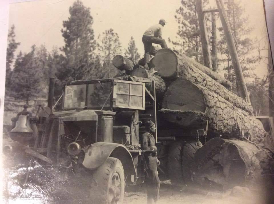 -trucks-logging-gnarly-log-truck-with-a-loco-bell-on-front-and-a-driverside-house-window-jpg-jpg.jpg