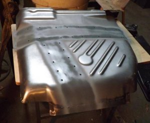 drivers floor pan weld thru galvanized primer.jpg