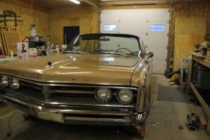 Half the hood buffed out.jpg