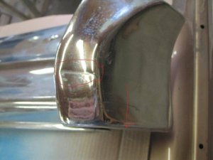 Rear bumper dent.sm.jpg