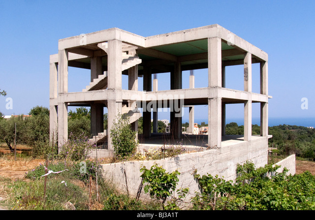 abandoned-construction-of-a-building-of-armoured-concrete-in-rethimno-bj3a1t.jpg